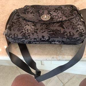 Baggalini cross body.  Gray with black pattern. Gently worn.